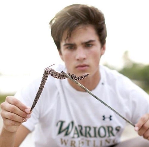 Walker Blanco with his pet snake