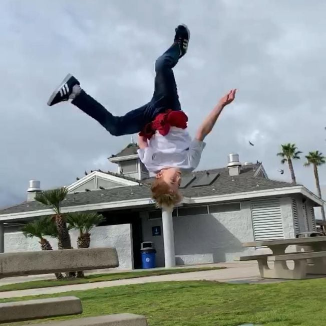 Walker Scobell while performing a flip