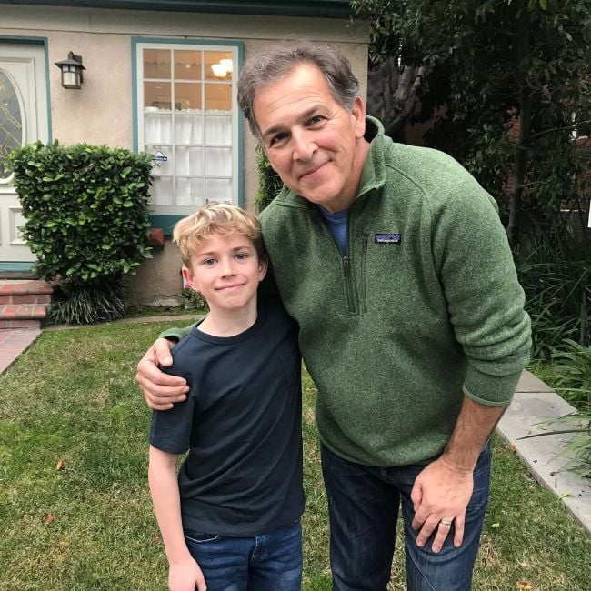 Walker Scobell with John D