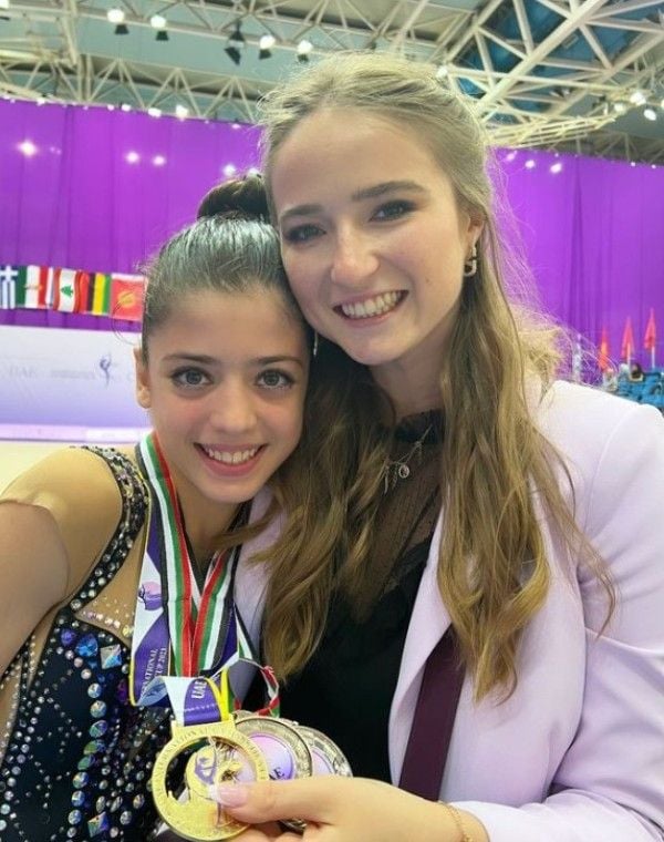 Ward Musharafieh with her head coach, Anastasiya Zakreuskaya