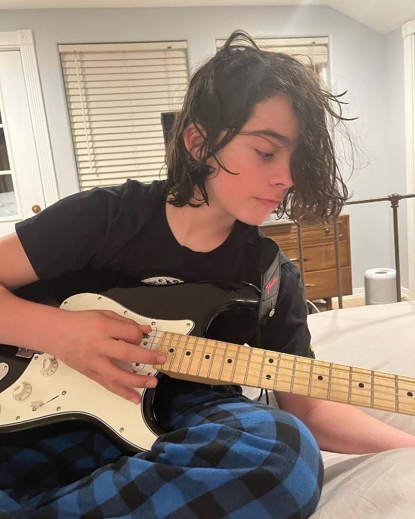 Wesley Kimmel playing guitar