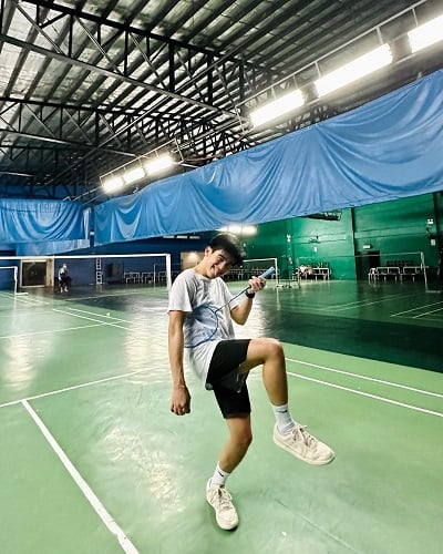 Will Ashley playing badminton