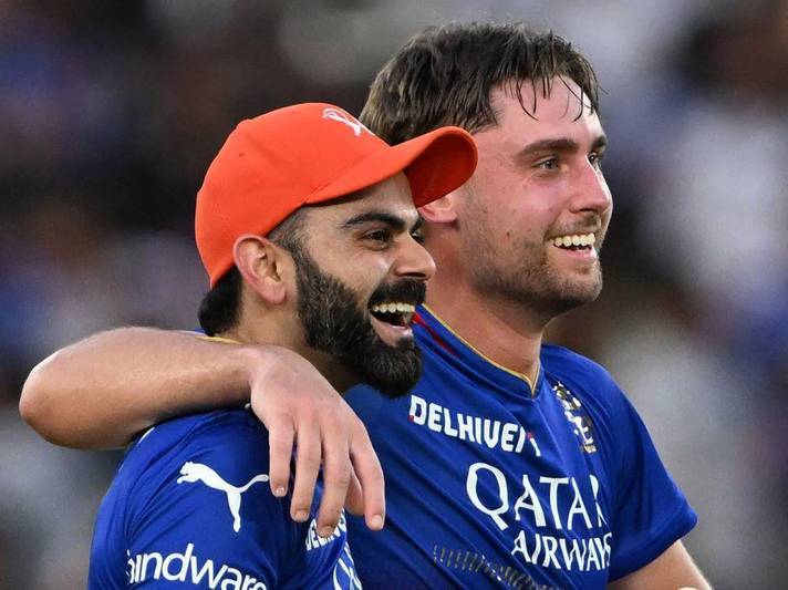 Will Jacks with Virat Kohli (left) after scoring his maiden IPL hundred