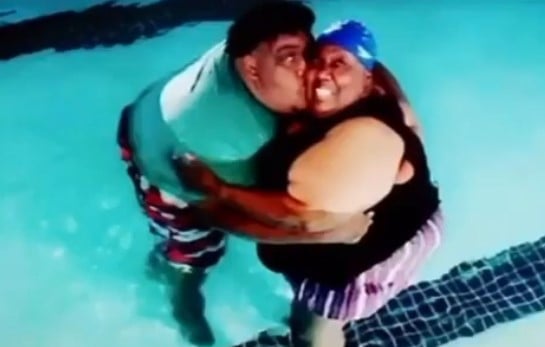 Willie Spence while swimming with his mother