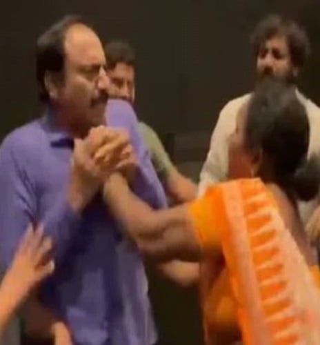 Woman attacking NT Ramaswamy in a theatre