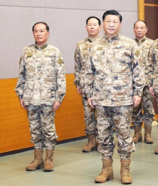 Xi Jinping in his military uniform after taking over as the Commander-in-Chief of the PLA