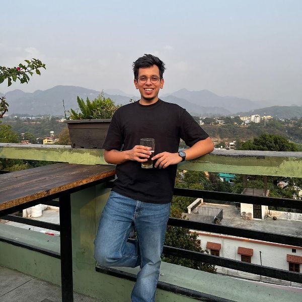 Yash Rathi drinking a beer