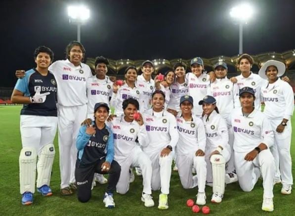 Yastika Bhatia posing with her team after the Pink Ball test match against Australia