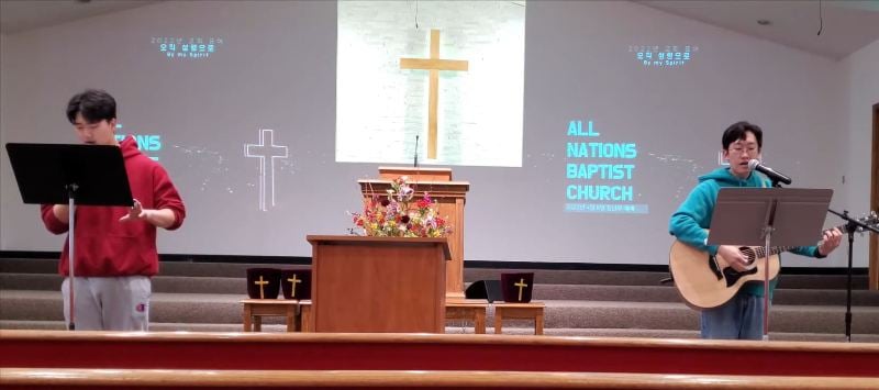 Yechan C. Lee performing at a church