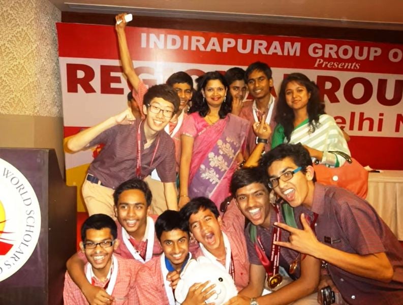 Yechan C. Lee posing with his schoolmates after winning a debate competition in New Delhi