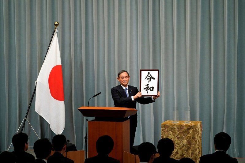 Yoshihide Suga announcing the name of the new imperial era, Reiwa