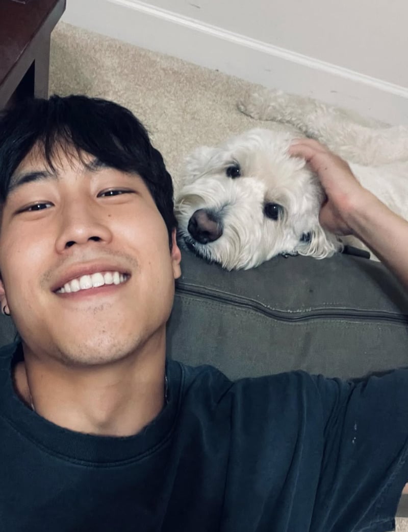 Young Mazino with his dog