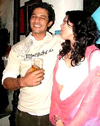 Yudhishtar Urs with a glass of alcohol