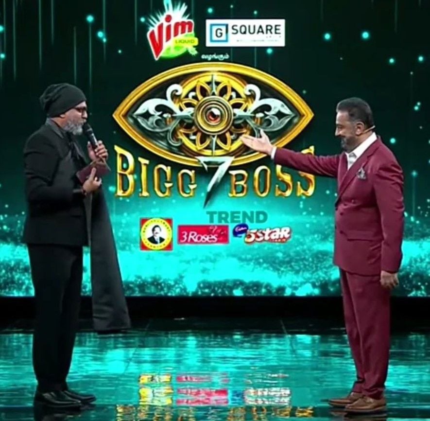 Yugendran with Kamal Haasan on the stage of 