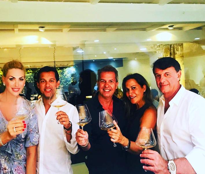 Yvonne Tihina (extreme left) while having wine