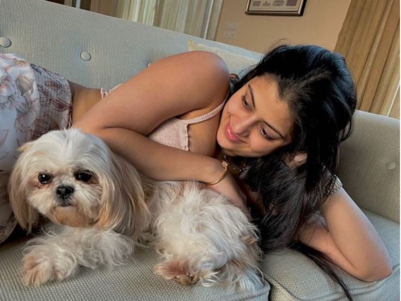 Zanai Bhosle with her pet dog