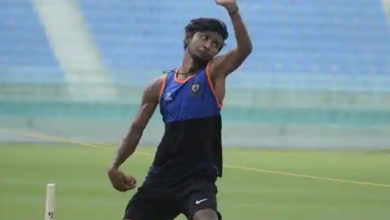 Zeeshan Ansari bowling during a practise session