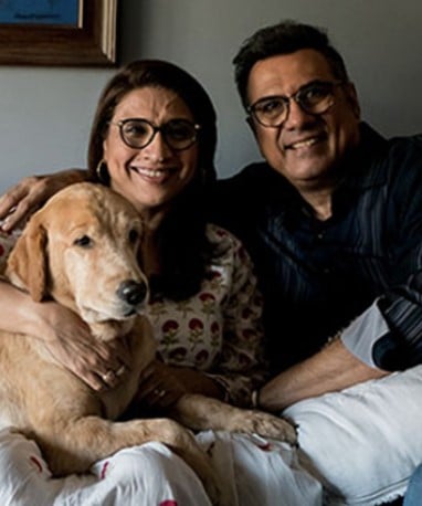 Zenobia Irani and Boman Irani with their pet dog
