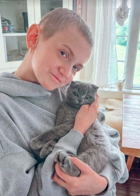 Zuza Beine with her pet cat