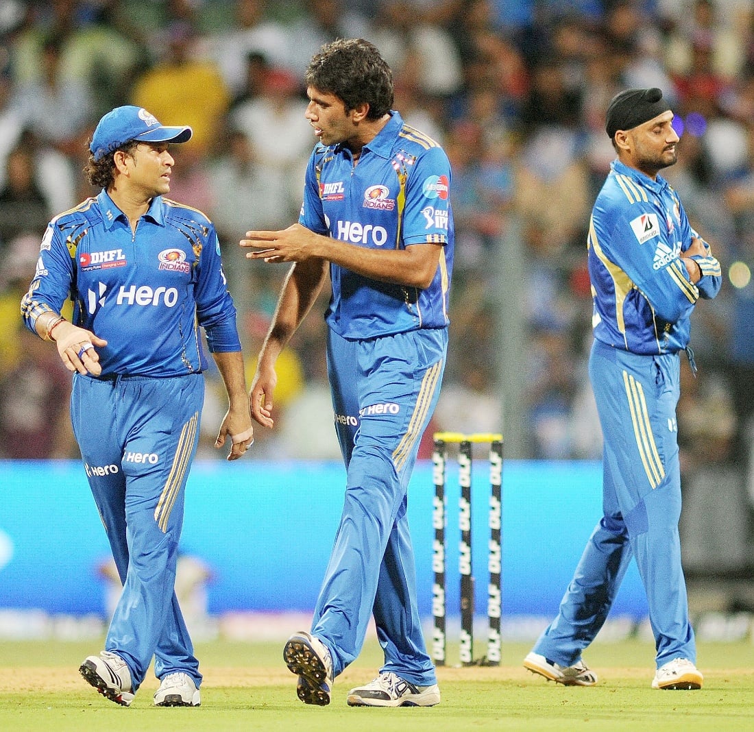 Munaf Patel with Sachin Tendulkar during an IPL match