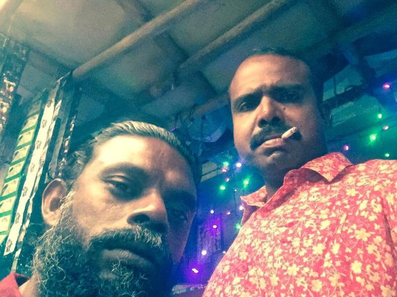 Vinod Jose smoking cigarette